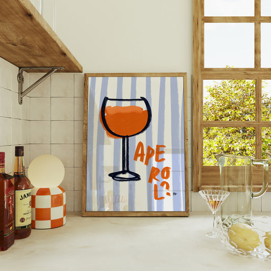 Framed artwork with a glass design and 'Aperol?' text in a kitchen setting.
