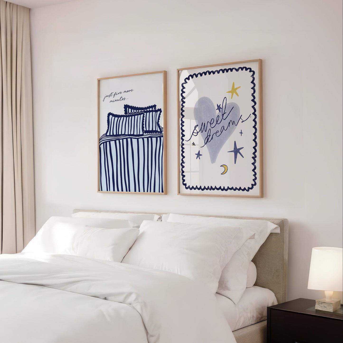 Neatly made bed in a bedroom with framed blue bedroom themed artwork on the wall, reading just five more minutes, and sweet dreams