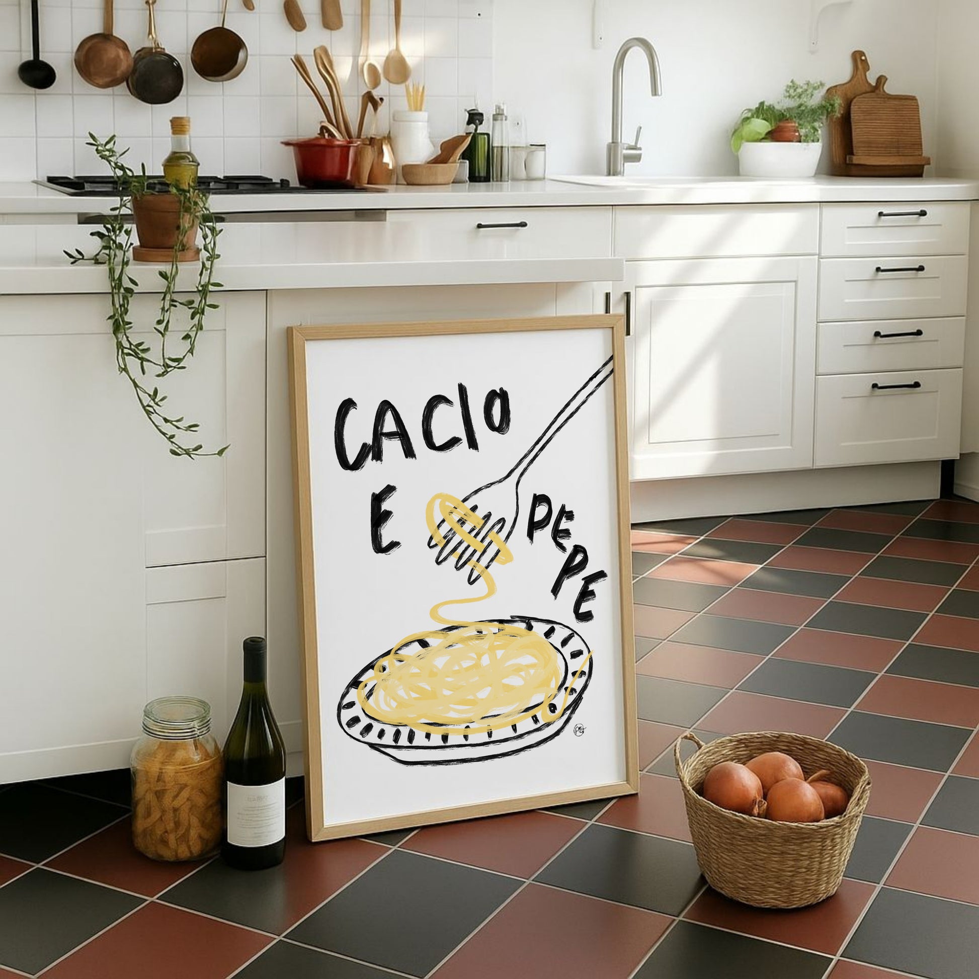 Kitchen with a framed poster of 'Cacio E Pepe' on a tiled floor.
