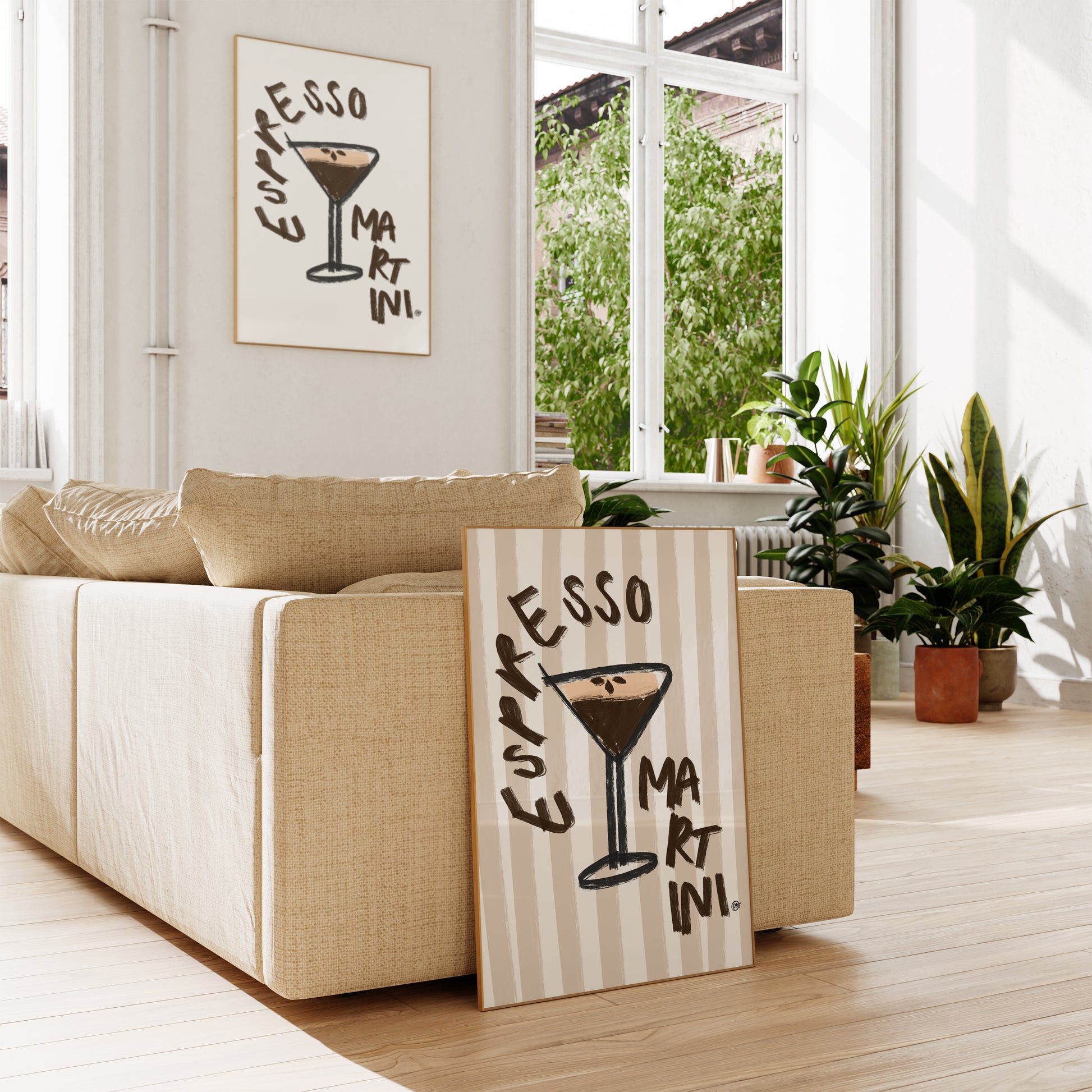 Living room with a beige sofa, decorative pillows, and a 'Espresso Martini' sign.