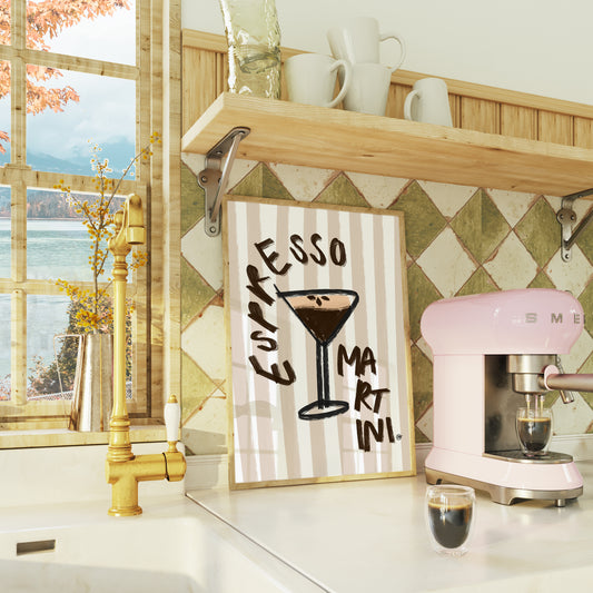 Kitchen counter with a pink coffee machine, glass of coffee, and 'Espresso Martini' PRINT.