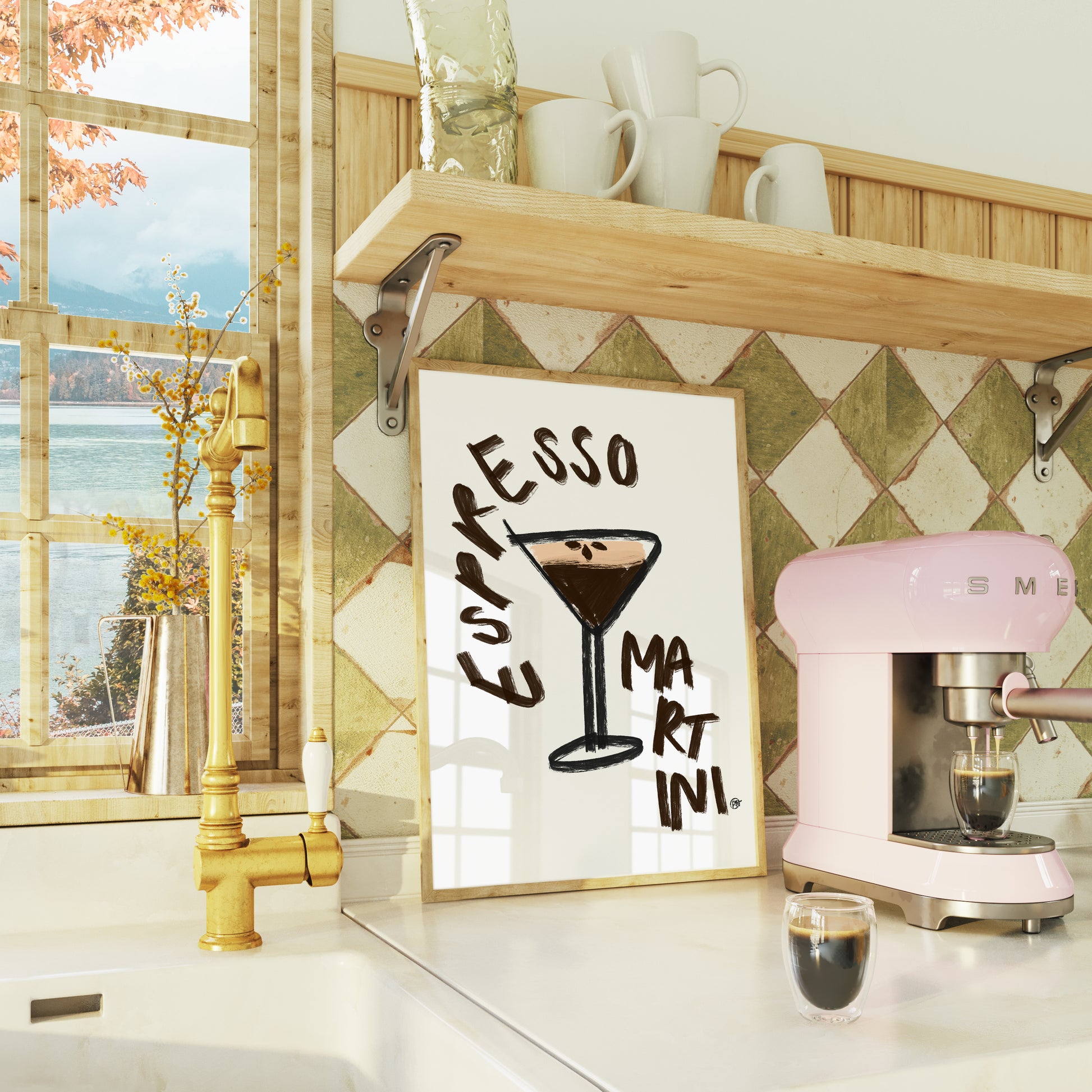 Kitchen counter with a pink coffee machine, 'Espresso Martini' print, and window view.