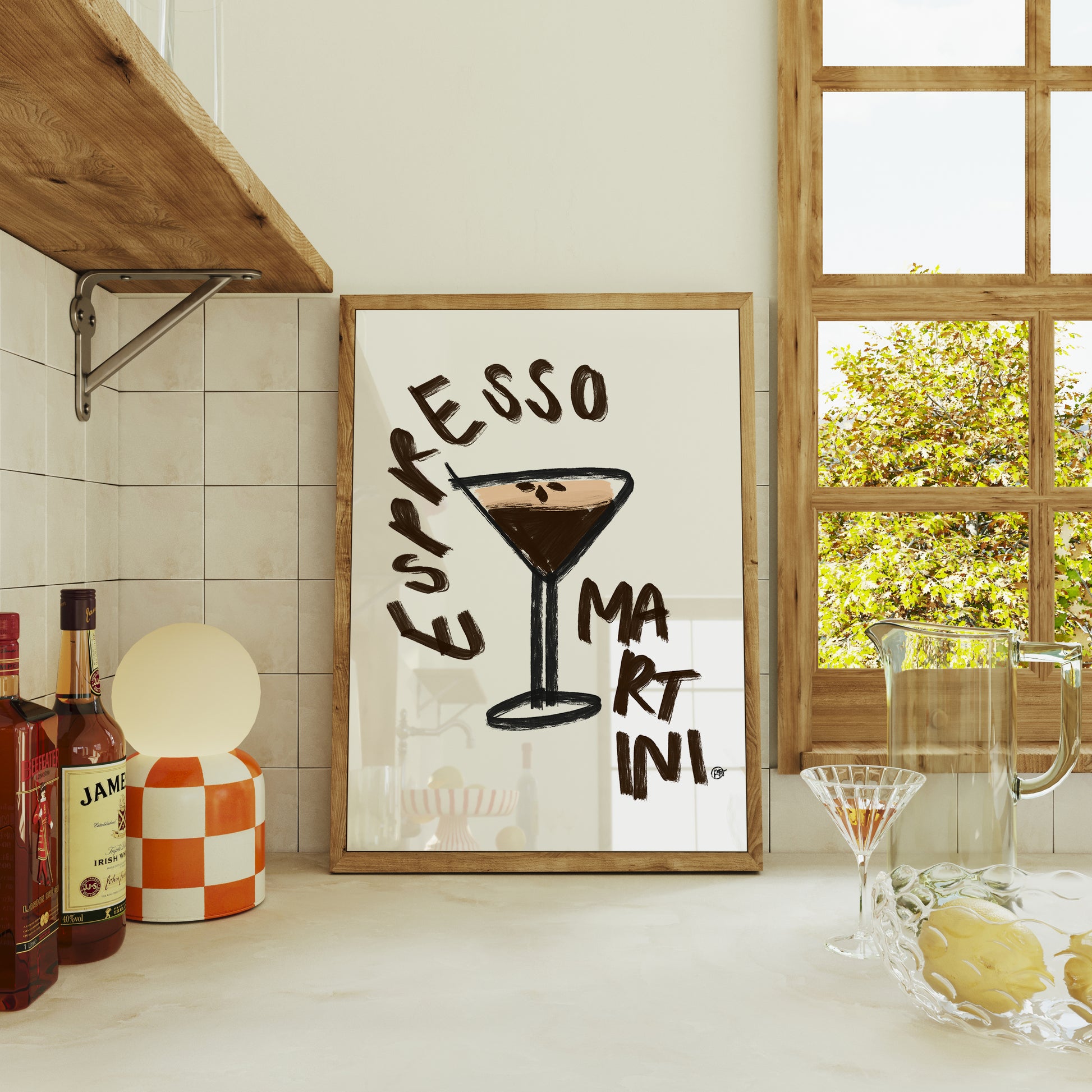 Framed artwork with 'Espresso Martini' text in a kitchen setting