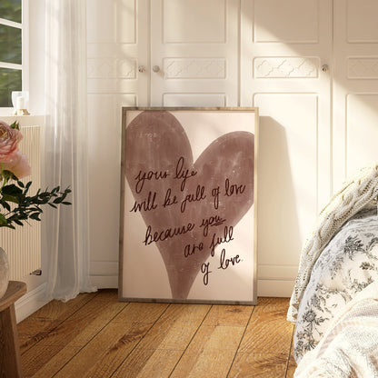 Heart-shaped wall art with motivational quote in a bedroom setting