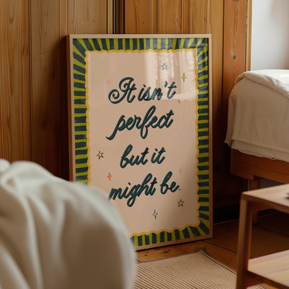 Framed motivational poster with text in a room with wooden walls and furniture.