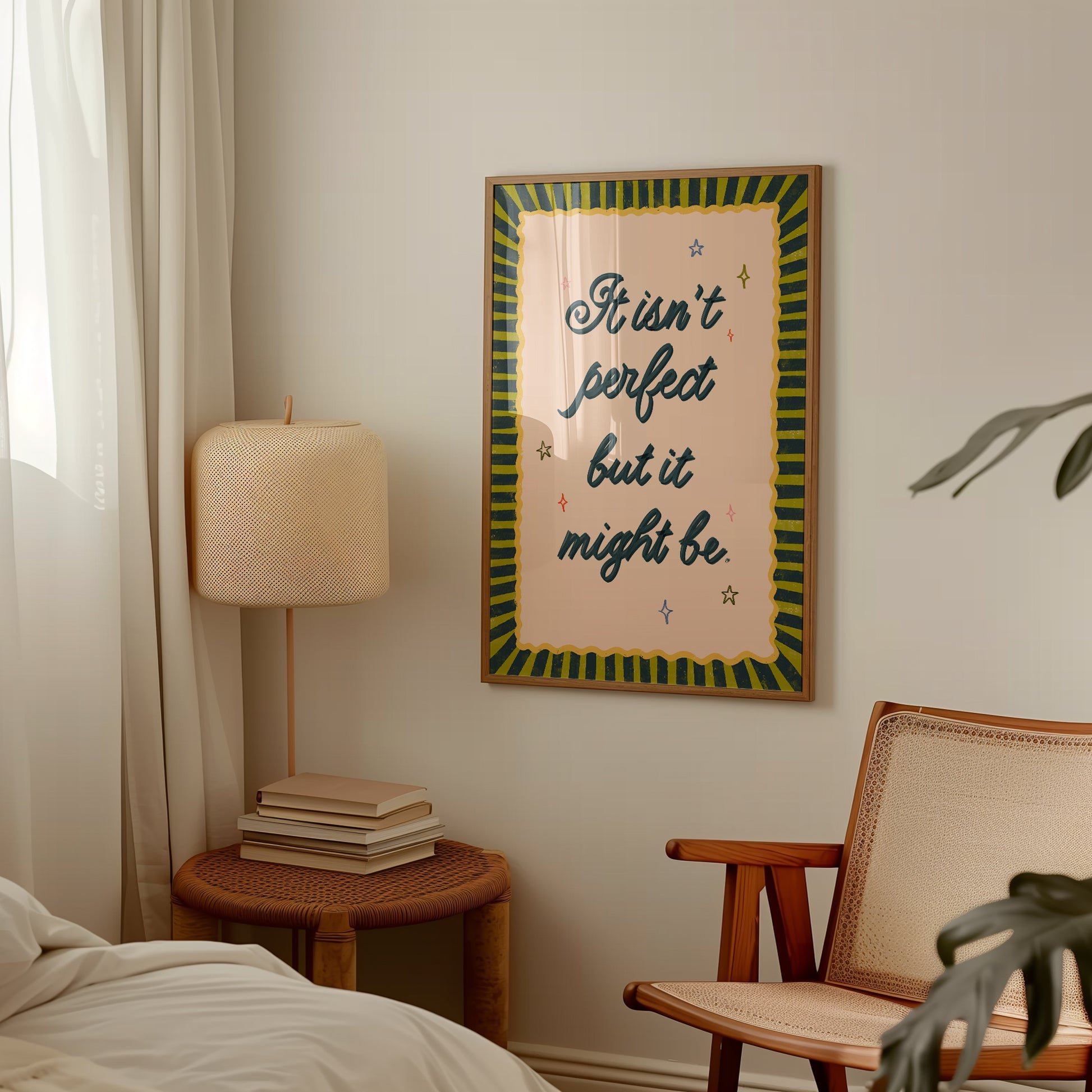 Room interior with a framed quote on the wall, lamp, and chair.