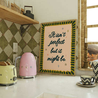 Kitchen counter with pink mini-fridge, yellow toaster, and framed quote on wall.