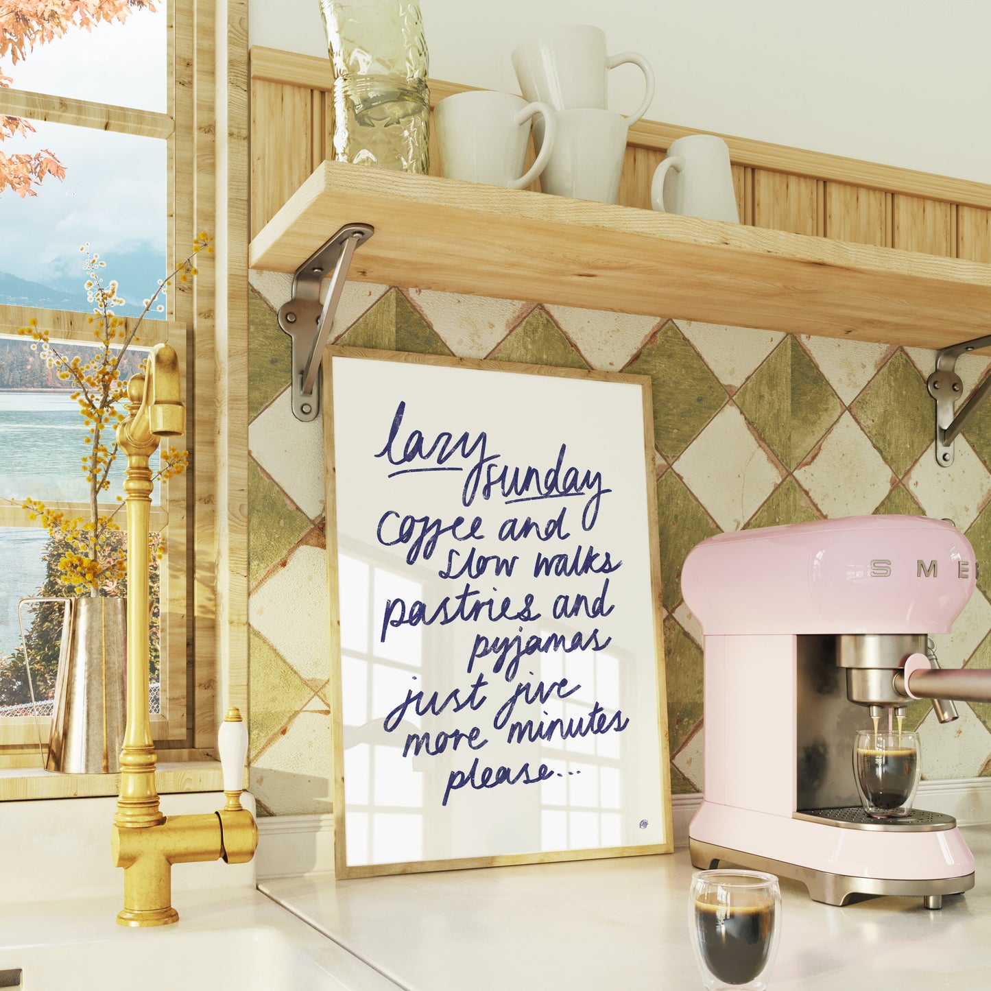 Kitchen counter with pink Smeg coffee machine, lightbox with text, and window view.