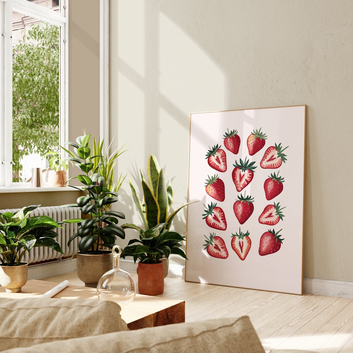 Living room with plants and a strawberry-themed wall art