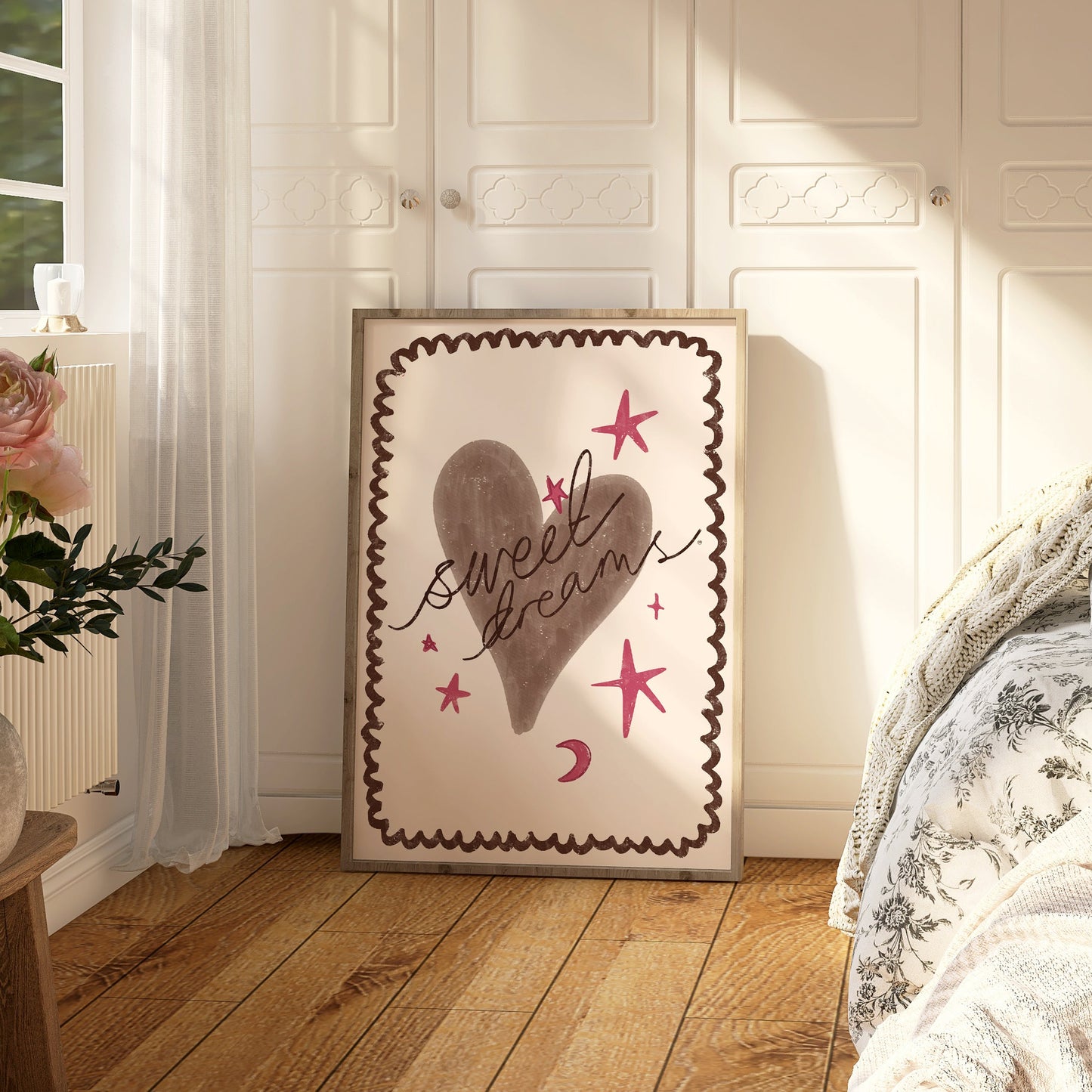 Decorative wall art with heart and text in a bedroom setting reading sweet dreams