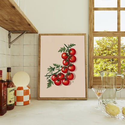 Framed artwork of tomatoes on a kitchen counter with a window in the background